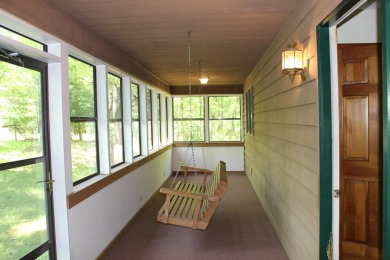 Check out this charming, cozy cabin w/ a fantastic corner lot on Hide-A-Way Hills Golf Club in Ohio - for sale on GolfHomes.com, golf home, golf lot