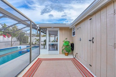 Lovingly maintained 3-bedroom, 2-bath pool home in Venice on Capri Isle Golf Club in Florida - for sale on GolfHomes.com, golf home, golf lot