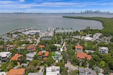 Luxurious coastal living in the exclusive island community of on Crandon Golf At Key Biscayne in Florida - for sale on GolfHomes.com, golf home, golf lot