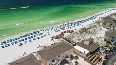 This beautifully updated freestanding three-bedroom beach villa on Sandpiper Cove Golf Course in Florida - for sale on GolfHomes.com, golf home, golf lot