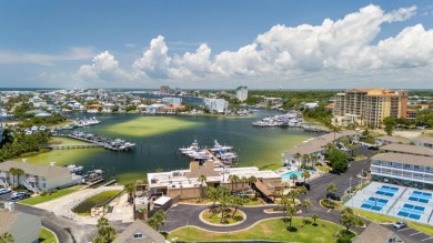 This beautifully updated freestanding three-bedroom beach villa on Sandpiper Cove Golf Course in Florida - for sale on GolfHomes.com, golf home, golf lot