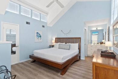 This beautifully updated freestanding three-bedroom beach villa on Sandpiper Cove Golf Course in Florida - for sale on GolfHomes.com, golf home, golf lot