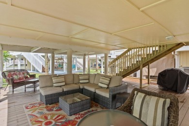 This beautifully updated freestanding three-bedroom beach villa on Sandpiper Cove Golf Course in Florida - for sale on GolfHomes.com, golf home, golf lot