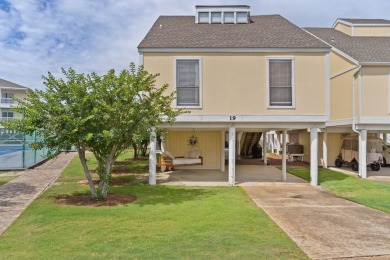 This beautifully updated freestanding three-bedroom beach villa on Sandpiper Cove Golf Course in Florida - for sale on GolfHomes.com, golf home, golf lot