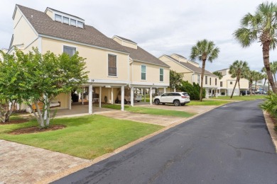 This beautifully updated freestanding three-bedroom beach villa on Sandpiper Cove Golf Course in Florida - for sale on GolfHomes.com, golf home, golf lot