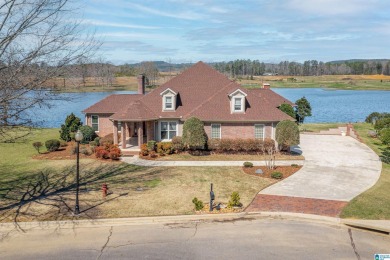 GORGEOUS BRICK ONE LEVEL on lake peninsula in Silver Lakes on The Robert Trent Jones Golf Trail At Silver Lake in Alabama - for sale on GolfHomes.com, golf home, golf lot