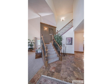 Nestled in the prestigious Fairway Estates, this exquisite home on Sage Lakes Municipal Golf Course in Idaho - for sale on GolfHomes.com, golf home, golf lot