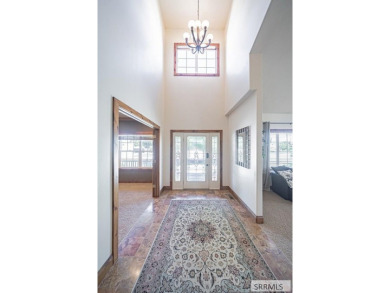 Nestled in the prestigious Fairway Estates, this exquisite home on Sage Lakes Municipal Golf Course in Idaho - for sale on GolfHomes.com, golf home, golf lot