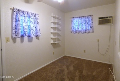 Inviting patio home in a vibrant 55+ active adult community! on Sunland Village Golf Club in Arizona - for sale on GolfHomes.com, golf home, golf lot