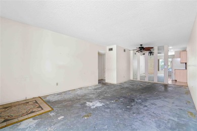 Opportunity meets potential in this top-floor 2-bedroom, 2-bath on On Top Of The World Golf Course in Florida - for sale on GolfHomes.com, golf home, golf lot