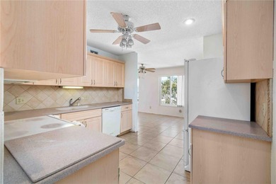 Opportunity meets potential in this top-floor 2-bedroom, 2-bath on On Top Of The World Golf Course in Florida - for sale on GolfHomes.com, golf home, golf lot