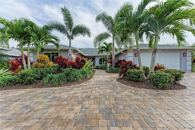 This luxuriously upgraded 5-bedroom, 3-bath home offers an on TPC Prestancia in Florida - for sale on GolfHomes.com, golf home, golf lot