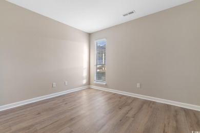 Discover coastal living at its finest in this 2-bedroom on Beachwood Golf Club in South Carolina - for sale on GolfHomes.com, golf home, golf lot