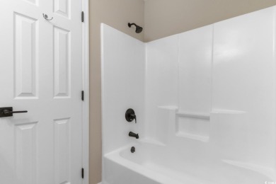Discover coastal living at its finest in this 2-bedroom on Beachwood Golf Club in South Carolina - for sale on GolfHomes.com, golf home, golf lot