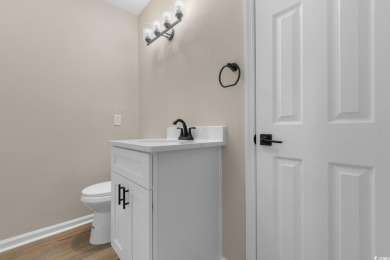 Discover coastal living at its finest in this 2-bedroom on Beachwood Golf Club in South Carolina - for sale on GolfHomes.com, golf home, golf lot
