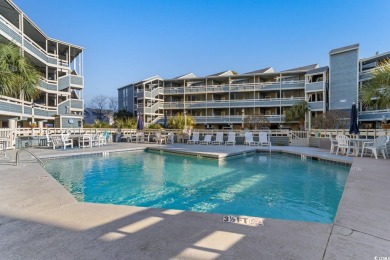 Discover coastal living at its finest in this 2-bedroom on Beachwood Golf Club in South Carolina - for sale on GolfHomes.com, golf home, golf lot