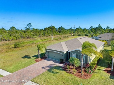 COME & SEE this MOVE-IN READY 4-bedroom, 2-bathroom home in a on Majors Golf Club At Bayside Lakes in Florida - for sale on GolfHomes.com, golf home, golf lot