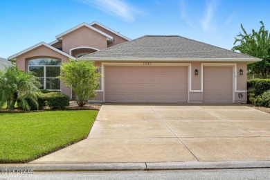Welcome to 1332 Sunningdale Lane, a beautifully maintained 3 on Plantation Bay Golf and Country Club in Florida - for sale on GolfHomes.com, golf home, golf lot