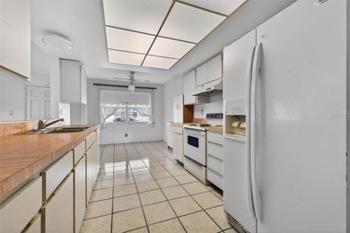 One or more photo(s) has been virtually staged. Discover on Mainlands Golf Club in Florida - for sale on GolfHomes.com, golf home, golf lot