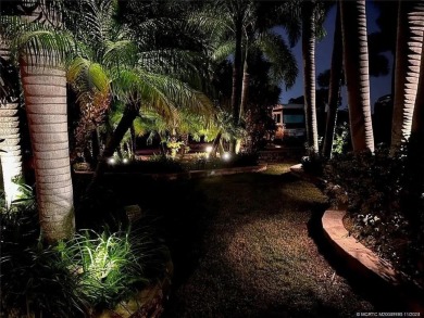 Experience the pinnacle of lakefront RV living with this on St. Lucie Trail Golf Club in Florida - for sale on GolfHomes.com, golf home, golf lot