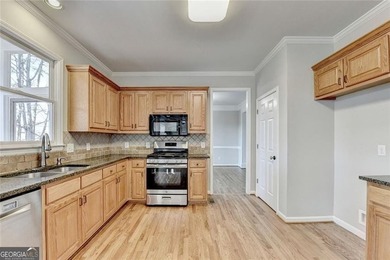 This is the home, beautiful golf course lot and view you have on Trophy Club of Apalachee in Georgia - for sale on GolfHomes.com, golf home, golf lot