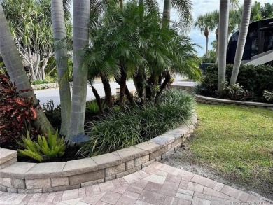 Experience the pinnacle of lakefront RV living with this on St. Lucie Trail Golf Club in Florida - for sale on GolfHomes.com, golf home, golf lot