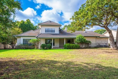 This impressive stone and stucco home, approximately 3,820 sq on Riverhill Country Club in Texas - for sale on GolfHomes.com, golf home, golf lot