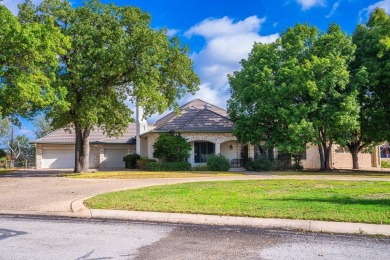 This impressive stone and stucco home, approximately 3,820 sq on Riverhill Country Club in Texas - for sale on GolfHomes.com, golf home, golf lot