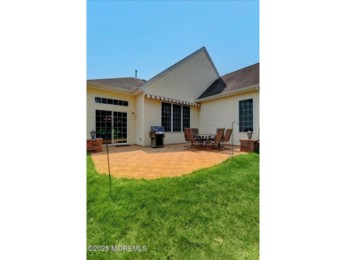 Perfectly positioned on an oversized lot with tranquil water on Westlake Golf and Country Club in New Jersey - for sale on GolfHomes.com, golf home, golf lot