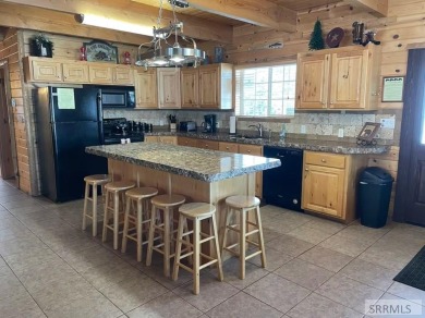 Beautiful cabin in the Island Park Village subdivision! Near the on Island Park Village Resort Golf Course in Idaho - for sale on GolfHomes.com, golf home, golf lot