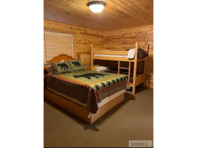 Beautiful cabin in the Island Park Village subdivision! Near the on Island Park Village Resort Golf Course in Idaho - for sale on GolfHomes.com, golf home, golf lot