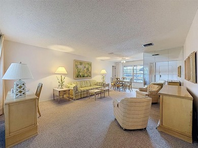 Welcome to this waterfront well-maintained two-bedroom, two-bath on Highland Lakes Executive Golf Course in Florida - for sale on GolfHomes.com, golf home, golf lot