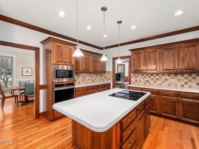 This charming Williamsburg-style custom-built home in the highly on Lochmere Golf Club in North Carolina - for sale on GolfHomes.com, golf home, golf lot