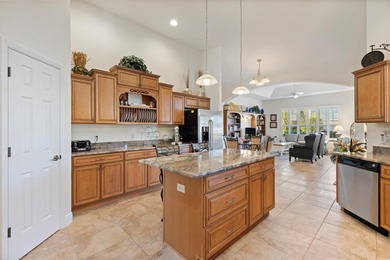 Welcome to 1116 Russell Loop, a stunning premier Chatham model on Glenview Championship Golf and Country Club in Florida - for sale on GolfHomes.com, golf home, golf lot