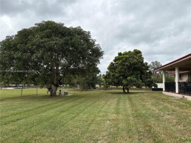 Beautiful 3/2 on 5 Acres with lots of Fruit trees . Back of on Redland Golf and Country Club in Florida - for sale on GolfHomes.com, golf home, golf lot