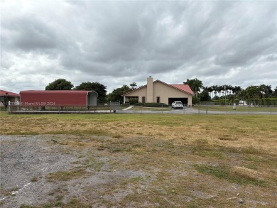 Beautiful 3/2 on 5 Acres with lots of Fruit trees . Back of on Redland Golf and Country Club in Florida - for sale on GolfHomes.com, golf home, golf lot