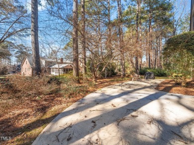 This charming Williamsburg-style custom-built home in the highly on Lochmere Golf Club in North Carolina - for sale on GolfHomes.com, golf home, golf lot