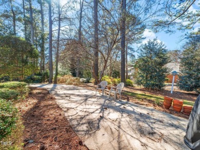 This charming Williamsburg-style custom-built home in the highly on Lochmere Golf Club in North Carolina - for sale on GolfHomes.com, golf home, golf lot