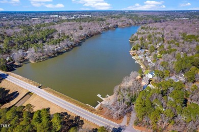 This charming Williamsburg-style custom-built home in the highly on Lochmere Golf Club in North Carolina - for sale on GolfHomes.com, golf home, golf lot