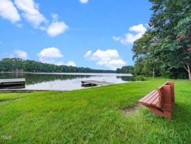 This charming Williamsburg-style custom-built home in the highly on Lochmere Golf Club in North Carolina - for sale on GolfHomes.com, golf home, golf lot