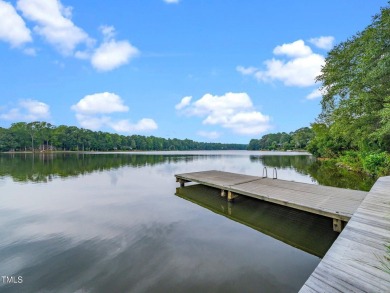 This charming Williamsburg-style custom-built home in the highly on Lochmere Golf Club in North Carolina - for sale on GolfHomes.com, golf home, golf lot