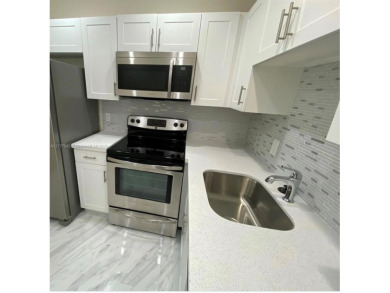 Priced for quick sale!! fully renovated 2BR/1.5BA top-floor on Flamingo Lakes Country Club in Florida - for sale on GolfHomes.com, golf home, golf lot