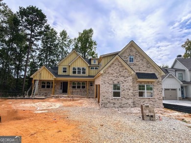 Exquisite Golf Course Retreat! Nestled on the pristine 3rd on Traditions of Braselton Golf Club in Georgia - for sale on GolfHomes.com, golf home, golf lot