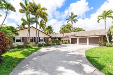 This thoughtfully cared for home offers 3 spacious bedrooms on Atlantis Golf Club in Florida - for sale on GolfHomes.com, golf home, golf lot