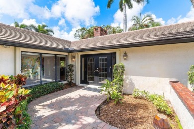 This thoughtfully cared for home offers 3 spacious bedrooms on Atlantis Golf Club in Florida - for sale on GolfHomes.com, golf home, golf lot