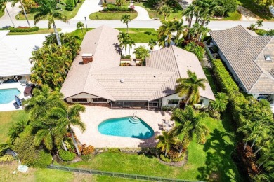 This thoughtfully cared for home offers 3 spacious bedrooms on Atlantis Golf Club in Florida - for sale on GolfHomes.com, golf home, golf lot