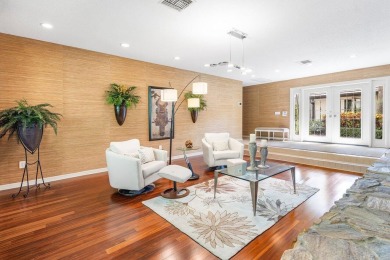 This thoughtfully cared for home offers 3 spacious bedrooms on Atlantis Golf Club in Florida - for sale on GolfHomes.com, golf home, golf lot