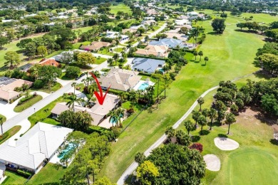 This thoughtfully cared for home offers 3 spacious bedrooms on Atlantis Golf Club in Florida - for sale on GolfHomes.com, golf home, golf lot
