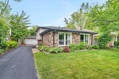 At first glance, this brick and sided split-level home may on Ravisloe Country Club in Illinois - for sale on GolfHomes.com, golf home, golf lot