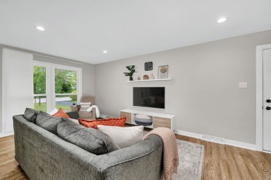 At first glance, this brick and sided split-level home may on Ravisloe Country Club in Illinois - for sale on GolfHomes.com, golf home, golf lot